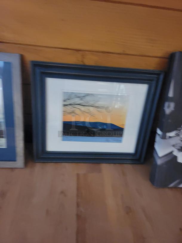 Framed wall art with a mountain landscape at sunset, part of black and white history and scenic landscapes collection.