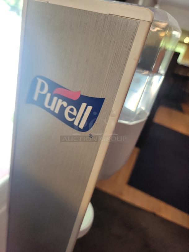 Purell 52" Automatic Hand Sanitizer Dispenser Stand, professional-grade, ideal for high-traffic areas, ensures hygiene.