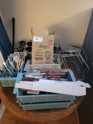 Extensive flatware and cutlery lot with various utensils, knife set, and Noble Products cutlery holder. Ideal for kitchens.