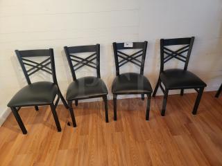 Set of 4 Lancaster dining chairs, black metal, cross-back design, padded vinyl seats, stylish, durable, ideal for dining rooms.