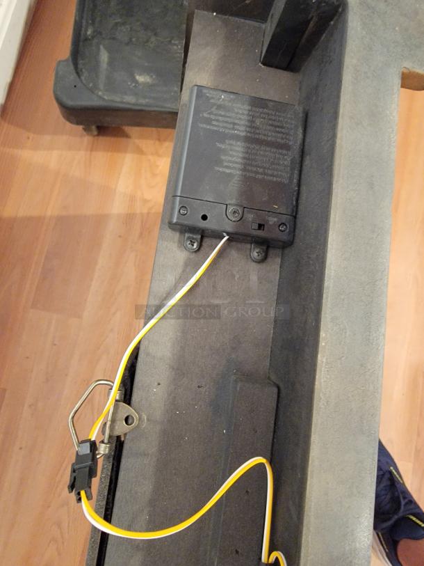 MD Sports Wall Mount Dart Board Cabinet Set, Model DRB100, showing battery compartment and wiring, in used condition.