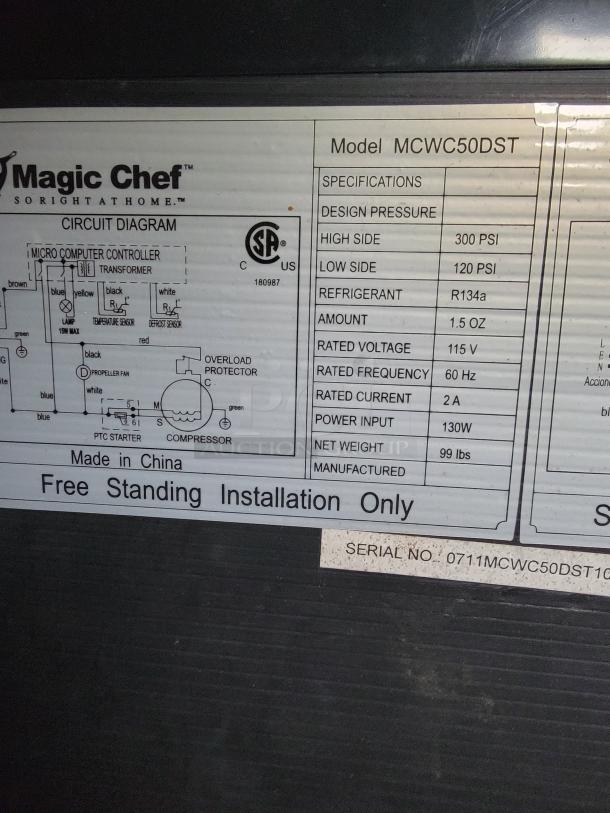 Magic Chef model MCWC50DST label with specs: 300 PSI high pressure, 120 PSI low pressure, R134a refrigerant, 115V voltage.