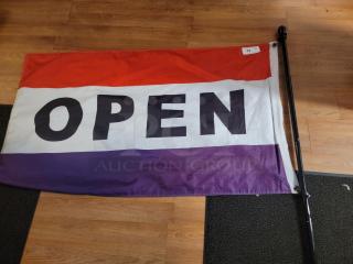 5'x3' "OPEN" flag with red, white, and purple stripes, includes a pole. In good condition, ideal for visibility.