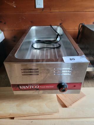 Avantco 177W43 electric food warmer, stainless steel, 12x27 inches. Features temperature control knob, ideal for buffets.