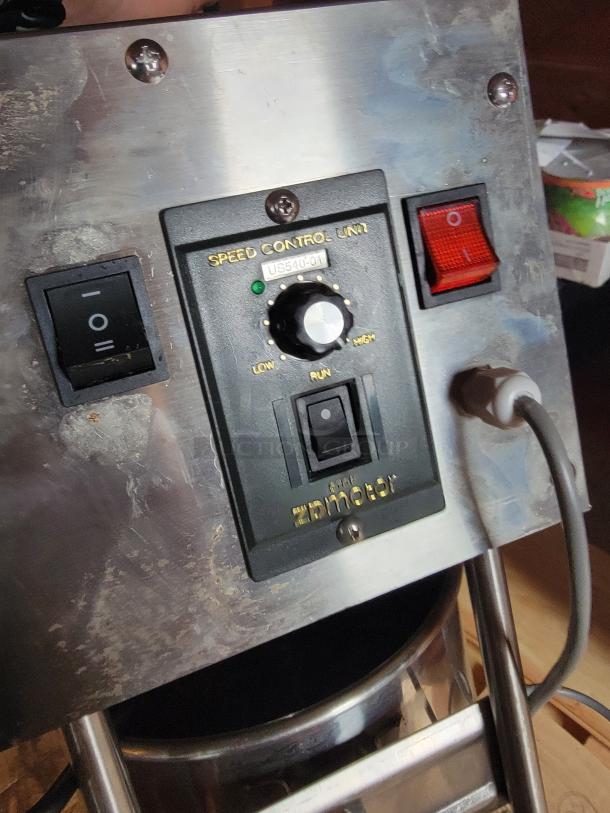Commercial electric sausage stuffer, model US540-01, with speed control. Ideal for butchers and restaurants.