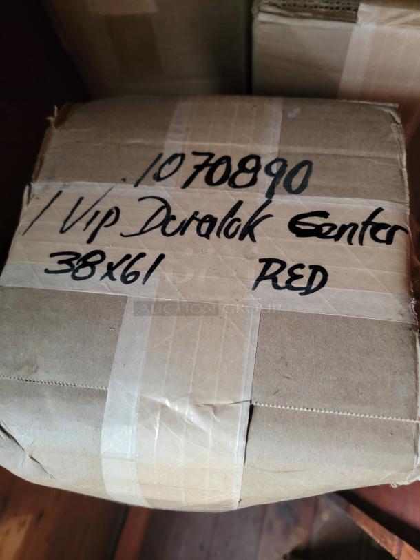 Box labeled "1070890, VIP Duralok Center, 38x61 RED" containing brand new Duraloc Cactus Floor Mats in red, 38"x61", set of 8.