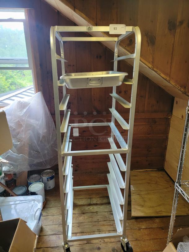 Advance Tabco commercial sheet pan rack on casters, holds multiple pans, aluminum, durable, excellent condition, mobile.