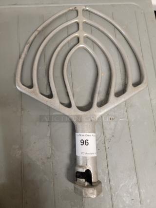 Hobart commercial mixer flat beater in durable metal, slight wear visible. Essential for bakeries, tagged number 96.