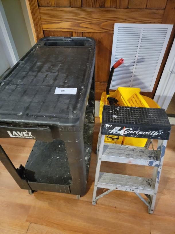 Commercial utility lot with black rolling cart, yellow mop bucket, and gray Louisville step ladder. Ideal for business or home use.