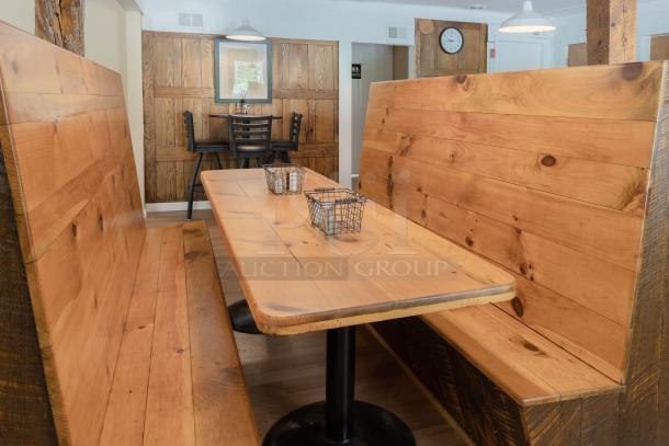Rustic wooden restaurant booth and table set, featuring solid wood construction, in good condition, ideal for cozy dining spaces.