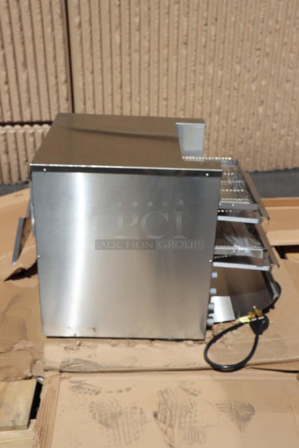 Brand new Vollrath JT4HC dual conveyor toaster, scratch & dent, stainless steel finish, visible power cord.