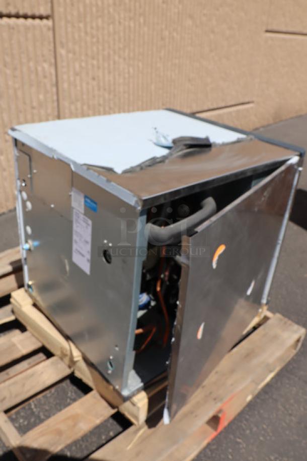 Brand new Scotsman Prodigy Plus Series 22" water-cooled nugget ice machine, model NS0422W-1, 455 lb capacity, scratch & dent condition, visible label details specs.