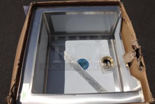 Brand new Regency 16-gauge stainless steel mop sink with notched front. Scratch and dent condition in original packaging.