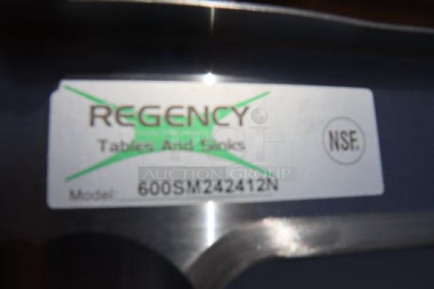 Regency 16-gauge stainless steel mop sink, notched front bowl, model 600SM242412N, brand new, label shows NSF certification.