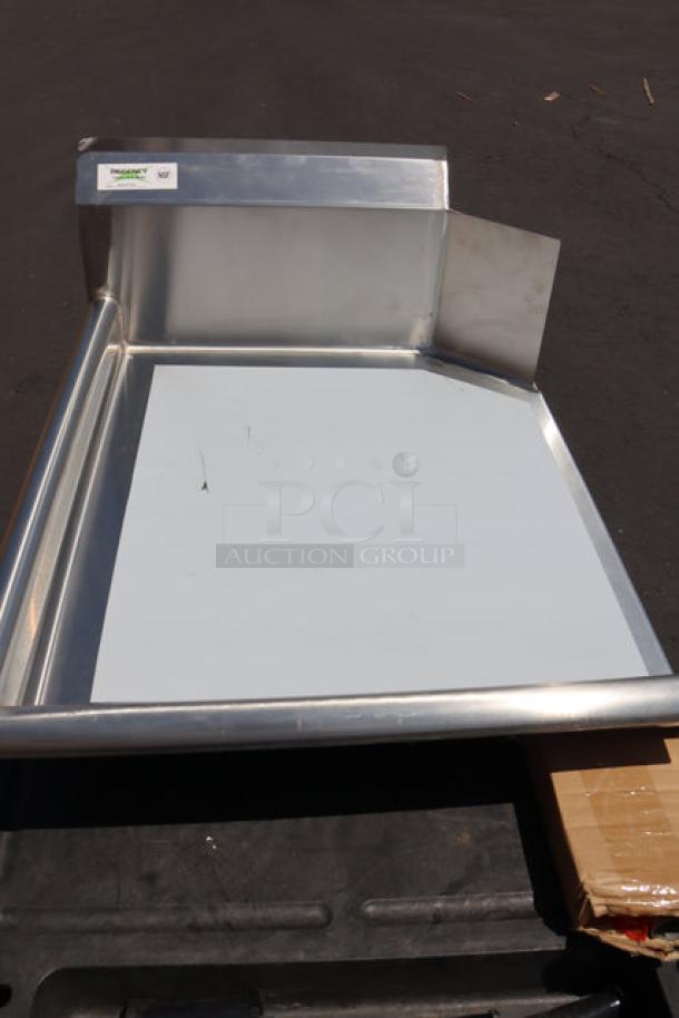 BRAND NEW Regency 16 Gauge 2' Clean Dish Table with left drainboard, slight scratch, stainless steel.
