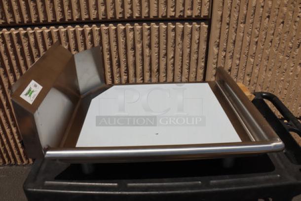 Brand new Regency 16 gauge 2' clean dish table with left drainboard, scratch & dent condition, stainless steel, with label.