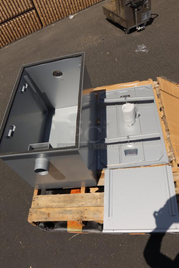 BRAND NEW Regency 35 GPM Grease Trap, model 600GT35, with 3" non-threaded connections, shown with packaging.