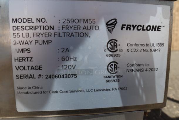 Label on Fryclone Fryer Oil Filter Machine showing model 2590FM55, 55 lb. capacity, 2-way pump, and 120V specifications.