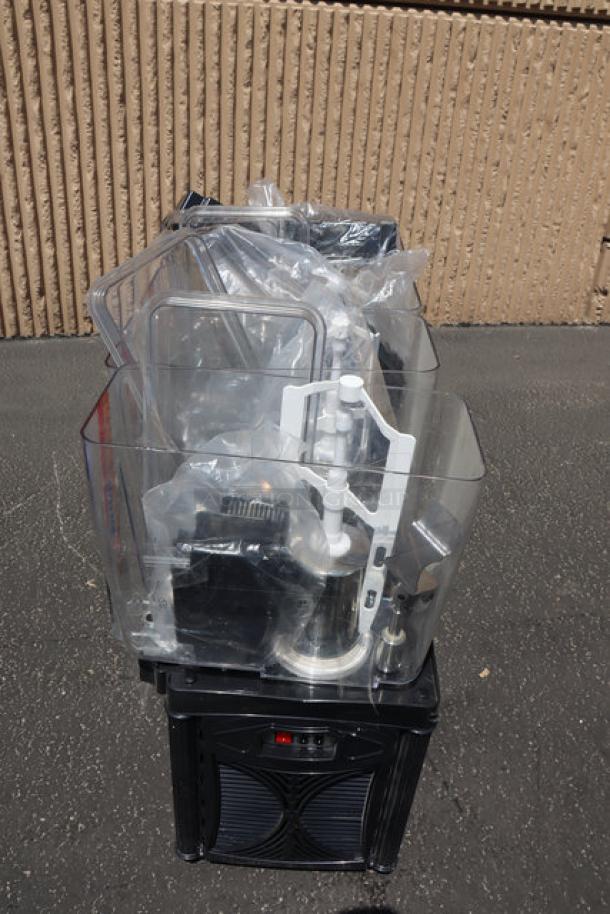Brand new Carnival King RBD5G4 beverage dispenser, quadruple 5-gallon bowls, 120V, scratch & dent condition, wrapped in plastic.