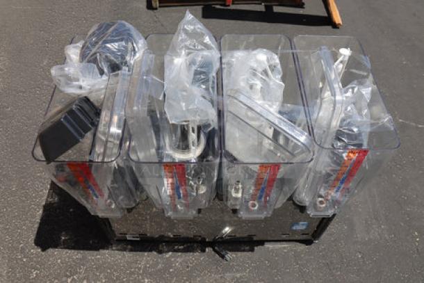 Brand new Carnival King RBD5G4 beverage dispenser, four 5-gallon bowls, scratch and dent condition, 120V, clear containers in packaging.