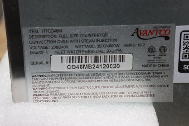 Brand new Avantco CO-46M convection oven label showing model, voltage, wattage, serial number, and warnings.