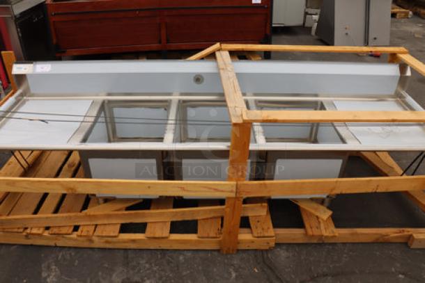 Regency 600S3182424 stainless steel three-compartment sink, 94", with minor scratches, no legs, in wooden crate.