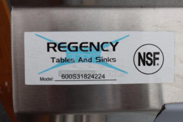 Regency sink label showing model 600S3182424 and NSF logo on stainless steel.