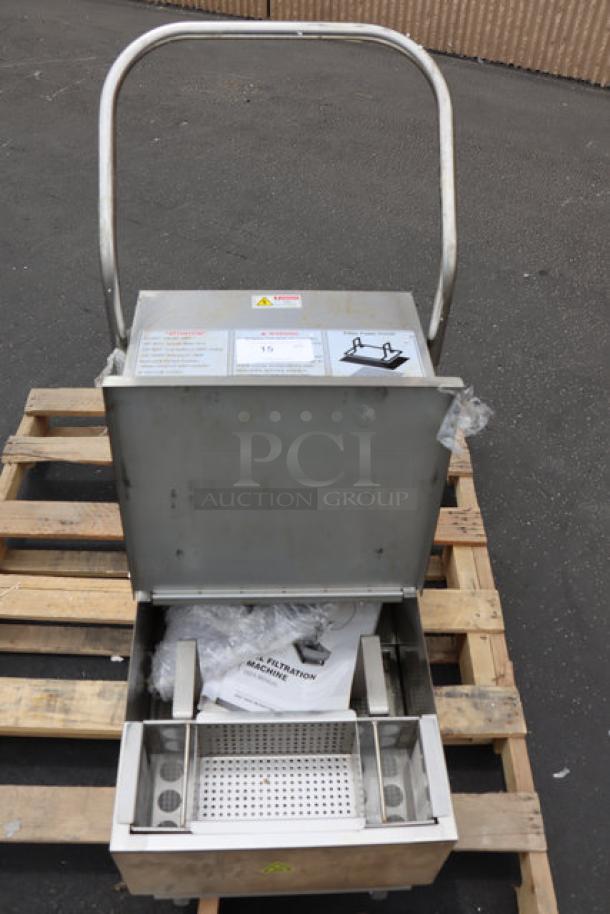 Fryclone 85 lb. oil filter machine, model 259OFM85, on a pallet. Features a 2-way pump, visible labels, and open compartment.