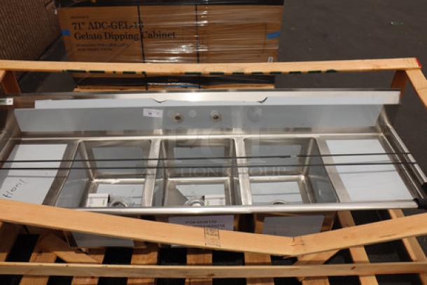 Regency 88" stainless steel three-compartment sink with drainboards. Minor scratches and dents. Model 600S31620218.