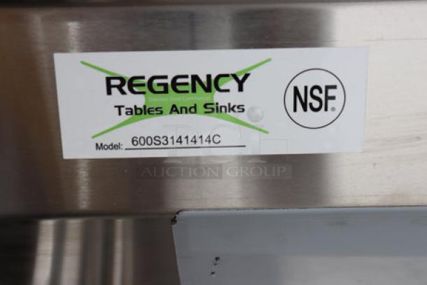 Regency 600S3141414XC commercial corner sink, brand new. Features 3 compartments, 14" x 14" x 14" bowls, two drainboards, and basket drains. NSF certified.
