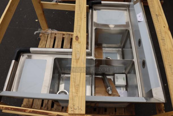 Brand new Regency 600S3141414XC stainless steel commercial sink with three 14" x 14" x 14" bowls and two drainboards.