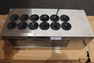 Summit Appliance STC12, 12-bottle countertop wine cooler, 115V. Scratches and dents visible. S/N: 2408K0011.