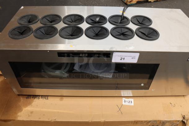 Summit Appliance STC12 countertop wine cooler, 12-bottle capacity, 115V, visible scratches and dents, tags with serial info.