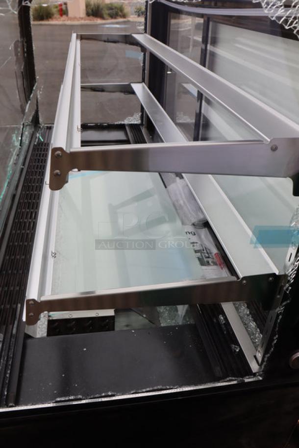 Avantco BC-60-HCB bakery display case, 60", black, curved glass, refrigerated, new condition with broken glass. S/N: 1644401100024.