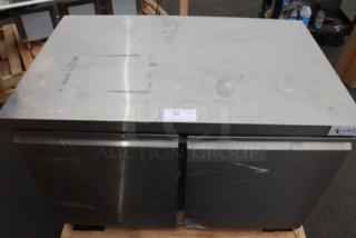 Avantco ZUC-48F-HC 48" undercounter freezer, scratched and dented, in working order. Model: ZUC-48F-HC, 115V, 4.5A, 300W.