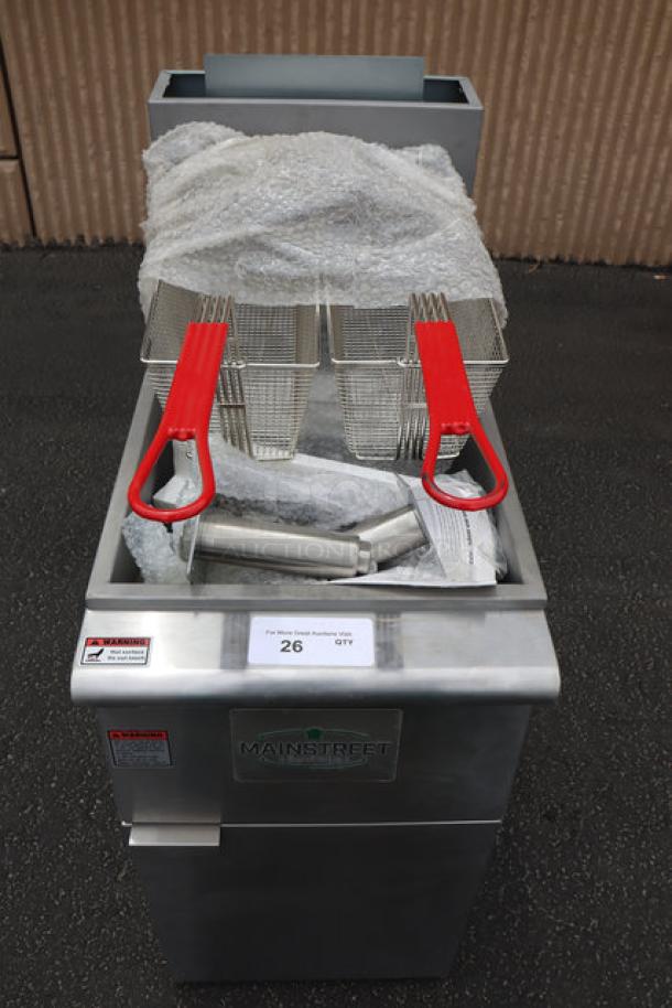 Brand new MainStreet Equipment 541FF40N natural gas fryer, 40 lb. capacity, stainless steel, 90,000 BTU, minor scratches.