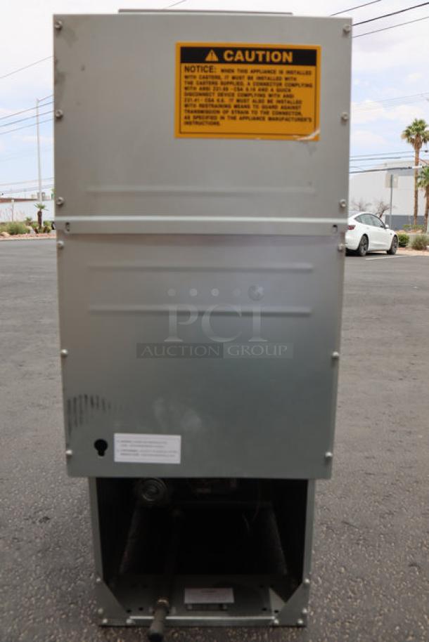 MainStreet Equipment stainless steel floor fryer, model 541FF40N, 40 lb capacity, natural gas, 90,000 BTU; caution label visible.