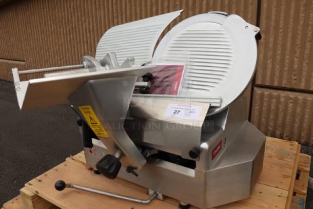 Brand new Estella SLA13 heavy-duty 13" automatic meat slicer; 3/4 hp, manual option. Serial: 20BDJD0704. No original packaging.