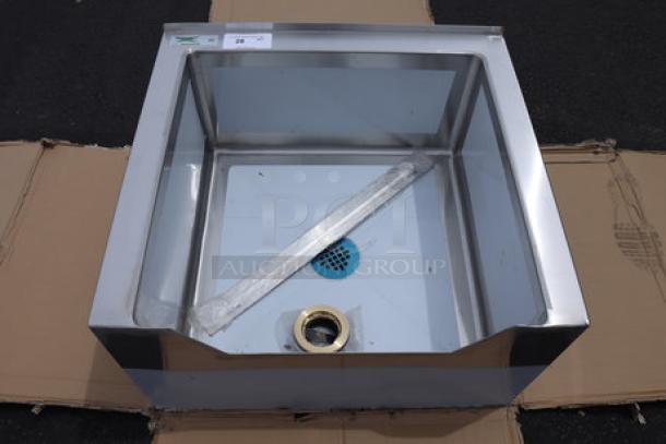Regency 600SM242412N stainless steel mop sink, 24"x24"x12" bowl, minor dent on backsplash. Original packaging damaged.