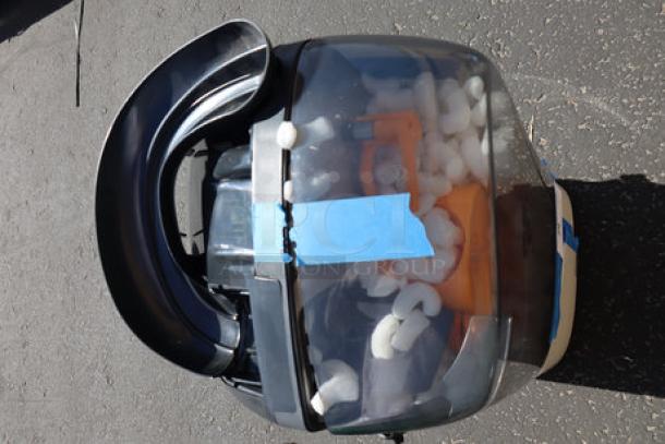 Zumex 04917 Dark Black Minex Juicer; minor front panel damage; 13 oranges/minute; multitension 100-240V; S/N: 496765.