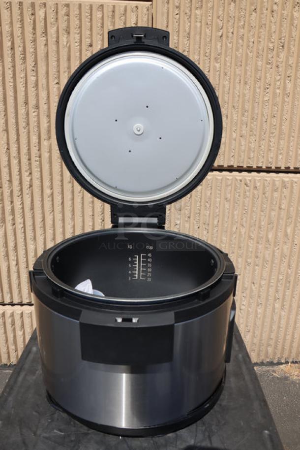 Brand new Avantco RCSB90 90 cup digital rice cooker/warmer with hinged lid, 240V, 2,500W, marked capacity inside.