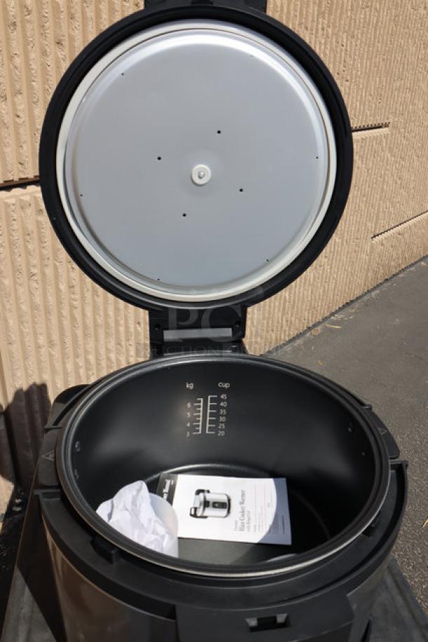 Brand new Avantco RCSB90 rice cooker, 90 cup capacity, digital control, hinged lid, visible measuring marks.