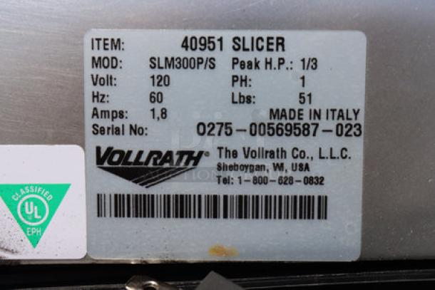 Vollrath 40951 12" meat slicer, UL certified, 2/5 hp, 120 volts, damaged sharpener support, serial 0275-00569587-023.