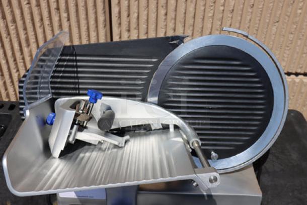 Vollrath 40951 12" meat slicer, medium duty, 2/5 hp, 120V. New with damaged sharpener support. S/N: 0275-00569587-023.