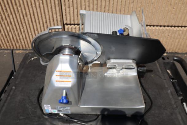 Vollrath 40951 12" medium-duty meat slicer, scratch-n-dent condition, damaged sharpener support, 2/5 hp, 120V, S/N: 0275-00569587-023.