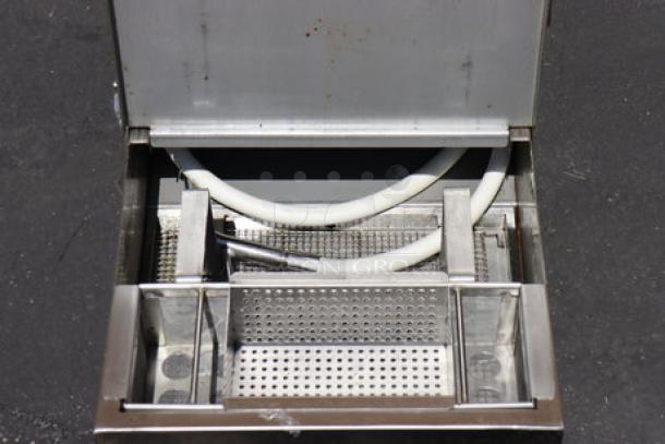 Fryclone 259OFM55 fryer oil filter machine, 55 lb. capacity, 2-way pump, brand new, oil spill visible, S/N: 2406041089.