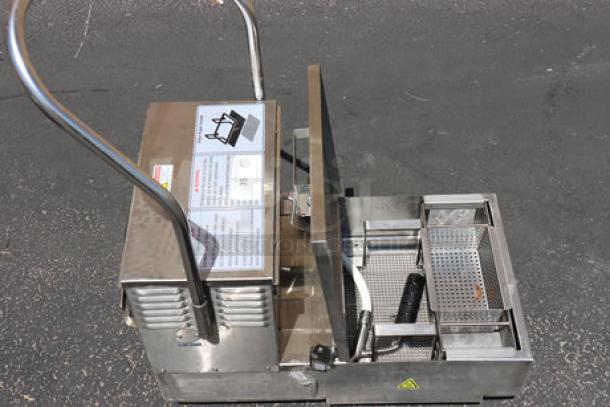 Fryclone 259OFM55 55 lb. fryer oil filter machine, new condition, food-grade oil present, 2-way pump, 120V.