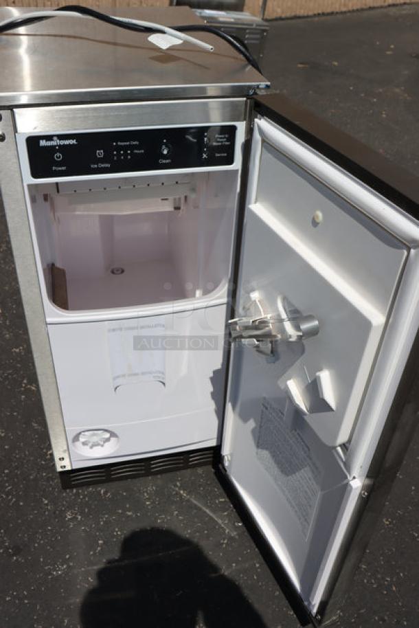 Manitowoc CrystalCraft Premier USE0050A-161 ice machine, 15" undercounter, air-cooled, 45 lb capacity, open door view, scratch & dent condition.