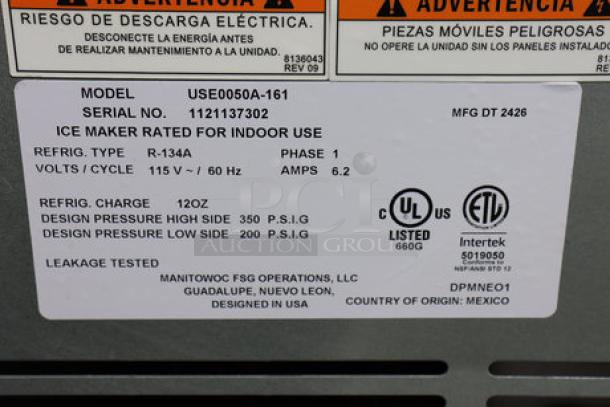 Manitowoc USE0050A-161 ice machine, serial 1121137302, 45 lb capacity, 115v. Label shows specs, UL listed, made in Mexico.
