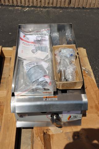 Brand new Cooking Performance Group GT-CPG-15-NL 15" gas countertop griddle with flame failure protection, thermostatic controls, 30,000 BTU. Includes manuals and parts in packaging; slight scratch-n-dent condition.